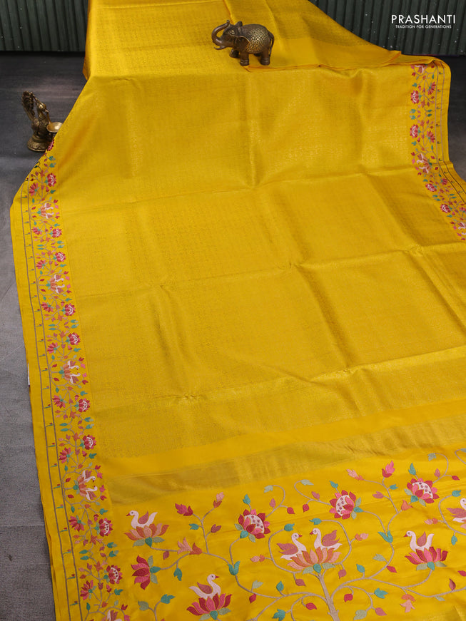 Pure kanchipuram silk saree yellow with allover zari checks & buttas and embroidery border