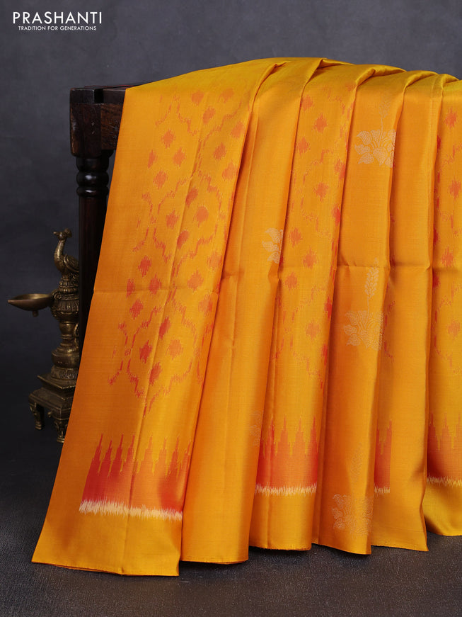Ikat soft silk saree mango yellow and red with allover ikat weaves & zari buttas in borderless style