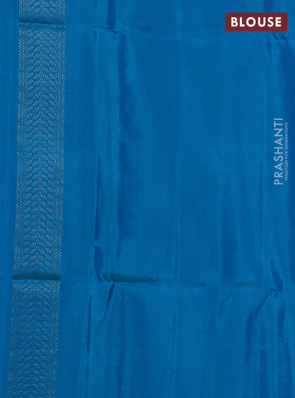 Ikat soft silk saree purple and dual tone blue with allover ikat weaves & zari buttas in borderless style