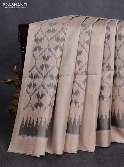Ikat soft silk saree beige and dark mustard with allover ikat weaves & zari buttas in borderless style