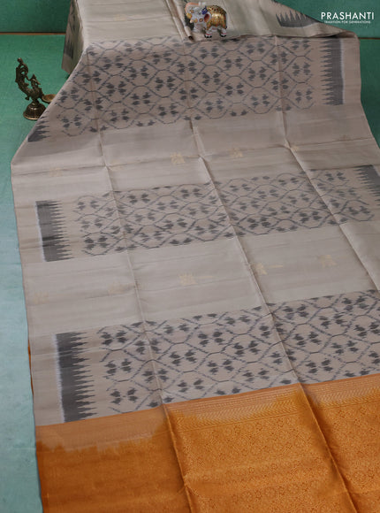 Ikat soft silk saree beige and dark mustard with allover ikat weaves & zari buttas in borderless style