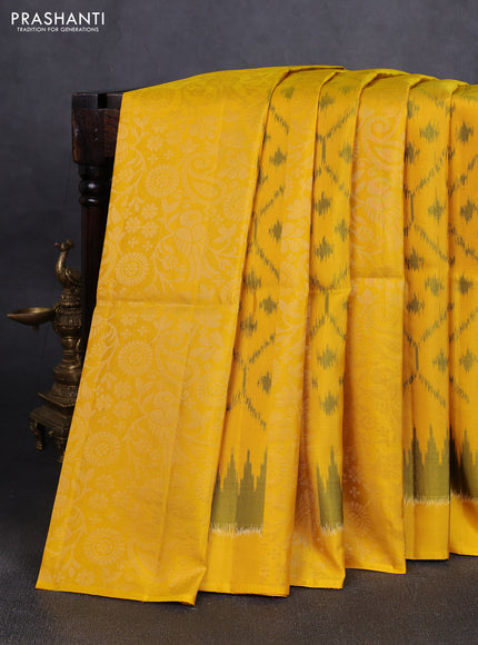 Ikat soft silk saree yellow and black with allover ikat & zari weaves in borderless style