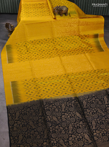 Ikat soft silk saree yellow and black with allover ikat & zari weaves in borderless style