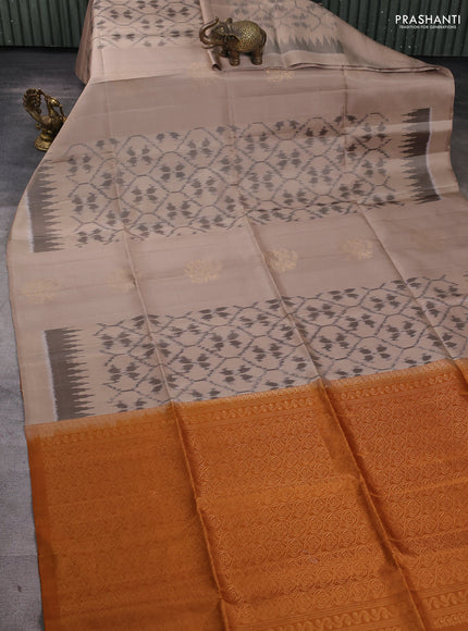 Ikat soft silk saree beige and dark mustard with allover ikat weaves & zari buttas in borderless style