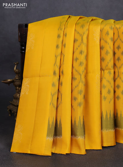 Ikat soft silk saree yellow and black with allover ikat weaves & zari buttas in borderless style