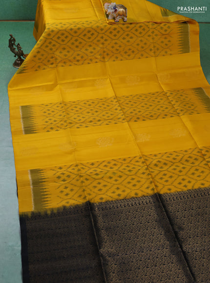 Ikat soft silk saree yellow and black with allover ikat weaves & zari buttas in borderless style