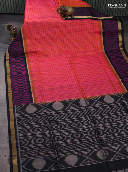Ikat soft silk saree dual tone pinkish orange and black with allover checks & ikat buttas and long ikat woven zari border