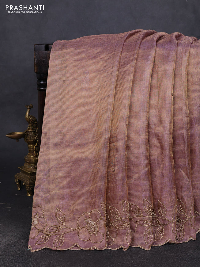 Tissue silk saree dual tone pastel purple with plain body and floral beaded embroidery work border