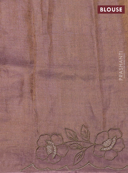 Tissue silk saree dual tone pastel purple with plain body and floral beaded embroidery work border