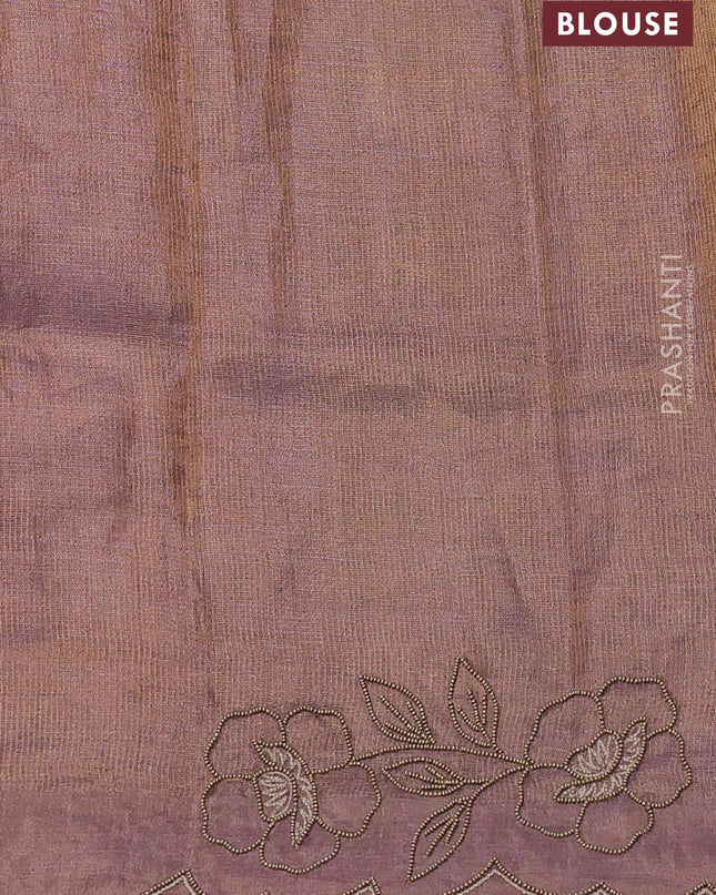 Tissue silk saree dual tone pastel purple with plain body and floral beaded embroidery work border