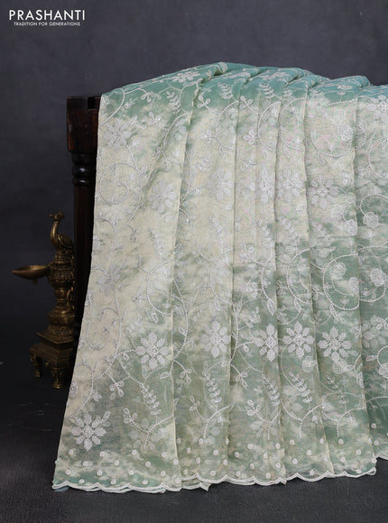 Tissue silk saree pastel green with allover embroidery & sequin work and beaded work border