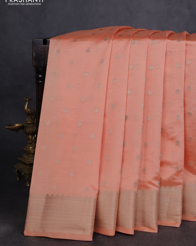 Semi raw silk saree pale orange with allover zari woven buttas and paithani weaving pallu
