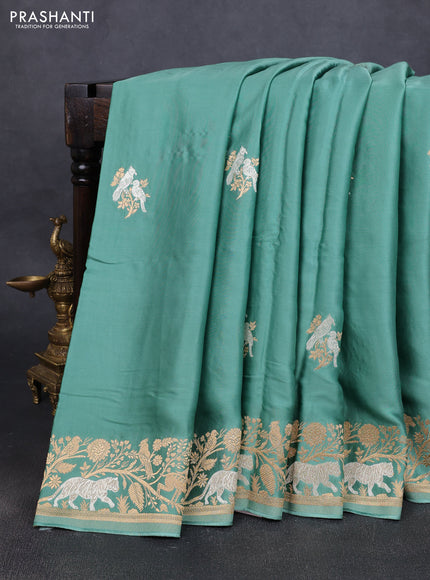 Art Mushru silk saree pastel green with zari woven buttas and zari woven border