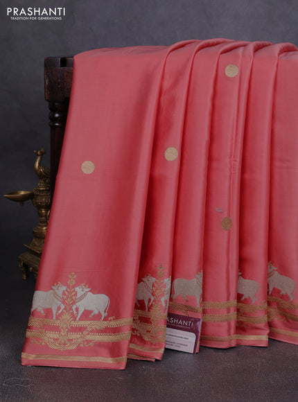 Art Mushru silk saree peach shade with zari woven geometric buttas and zari woven pichwai border