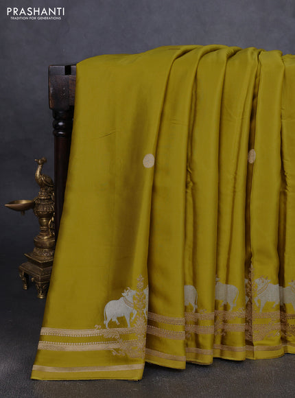Art Mushru silk saree mustard yellow with zari woven geometric buttas and zari woven pichwai border