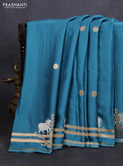 Art Mushru silk saree peacock blue with zari woven geometric buttas and zari woven pichwai border