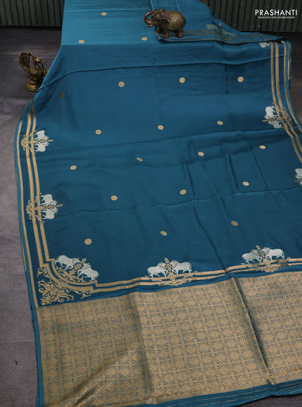 Art Mushru silk saree peacock blue with zari woven geometric buttas and zari woven pichwai border