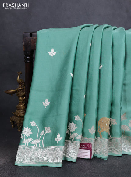 Art Mushru silk saree pastel green with zari woven buttas and zari woven pichwai border
