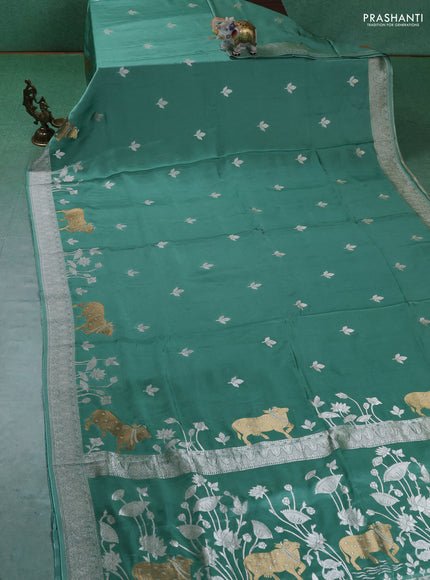 Art Mushru silk saree pastel green with zari woven buttas and zari woven pichwai border