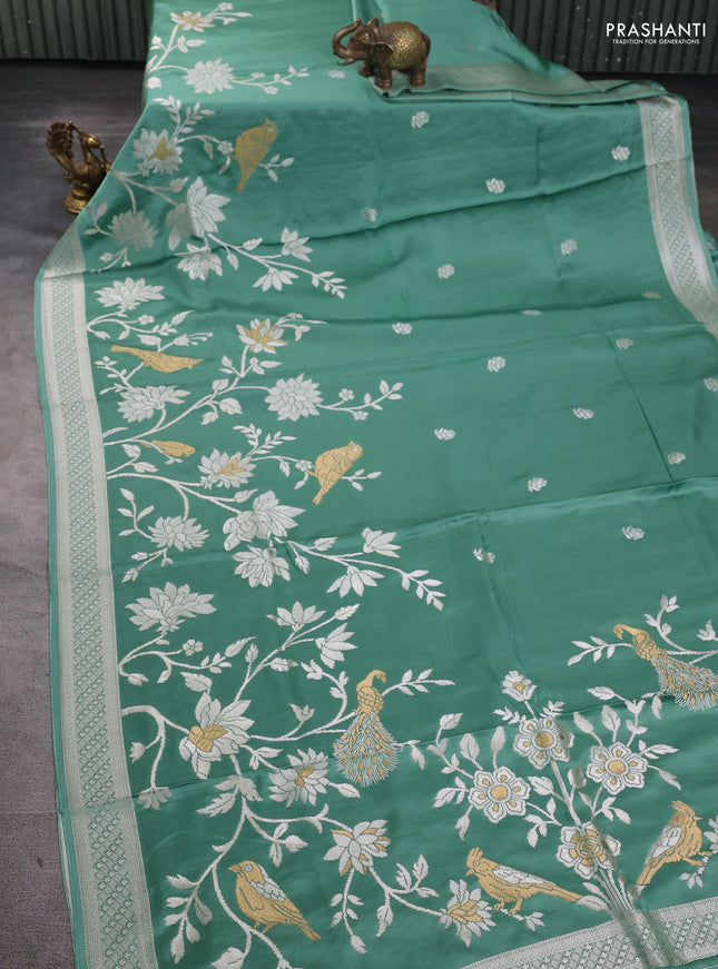 Art Mushru silk saree pastel green with zari woven buttas and long zari woven border