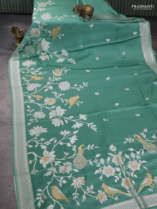 Art Mushru silk saree pastel green with zari woven buttas and long zari woven border