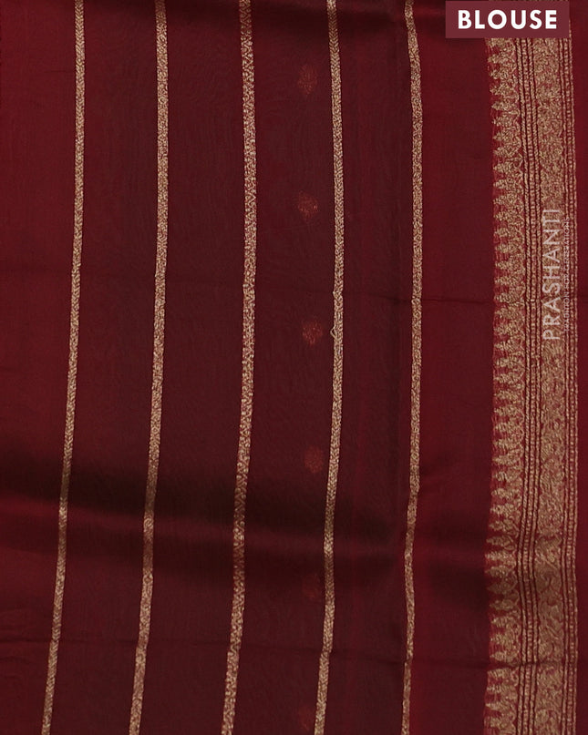 Banarasi organza silk saree green and red with woven buttas and banarasi style border