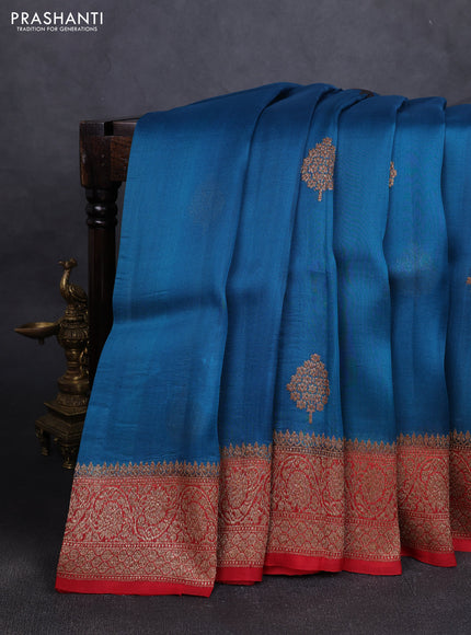 Banarasi organza silk saree cs blue and red with woven buttas and banarasi style border