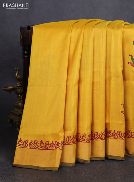 Uppada block printed silk saree lime yellow and coffee brown with paisley butta prints and zari woven border