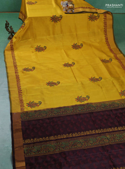 Uppada block printed silk saree lime yellow and coffee brown with paisley butta prints and zari woven border