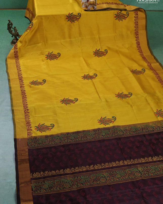 Uppada block printed silk saree lime yellow and coffee brown with paisley butta prints and zari woven border