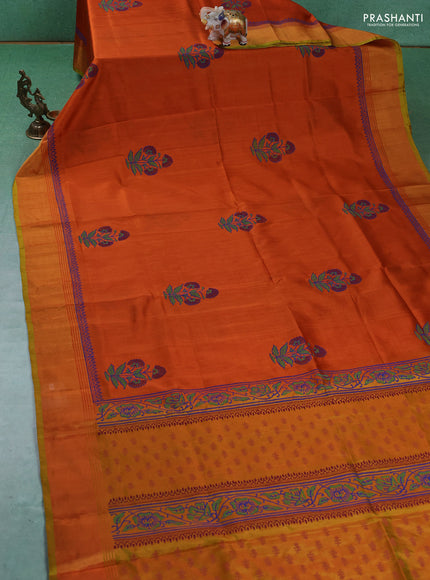 Uppada block printed silk saree rustic orange and dual tone musatrd green with floral butta prints and zari woven border
