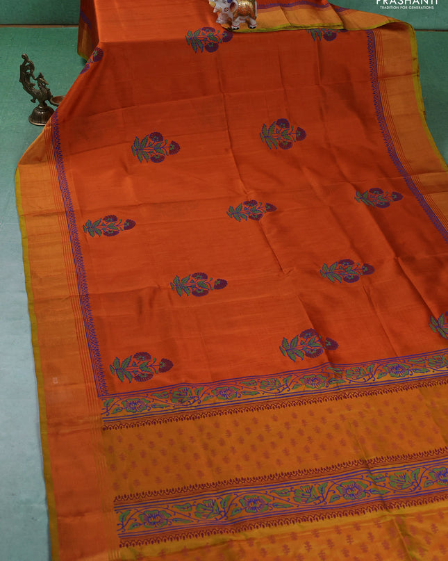 Uppada block printed silk saree rustic orange and dual tone musatrd green with floral butta prints and zari woven border