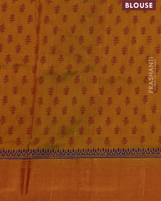 Uppada block printed silk saree rustic orange and dual tone musatrd green with floral butta prints and zari woven border