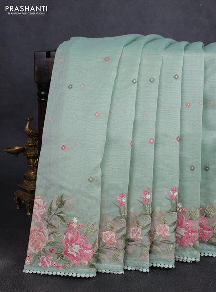 Chander tissue saree pastel green with embroidery work and floral embroidery border