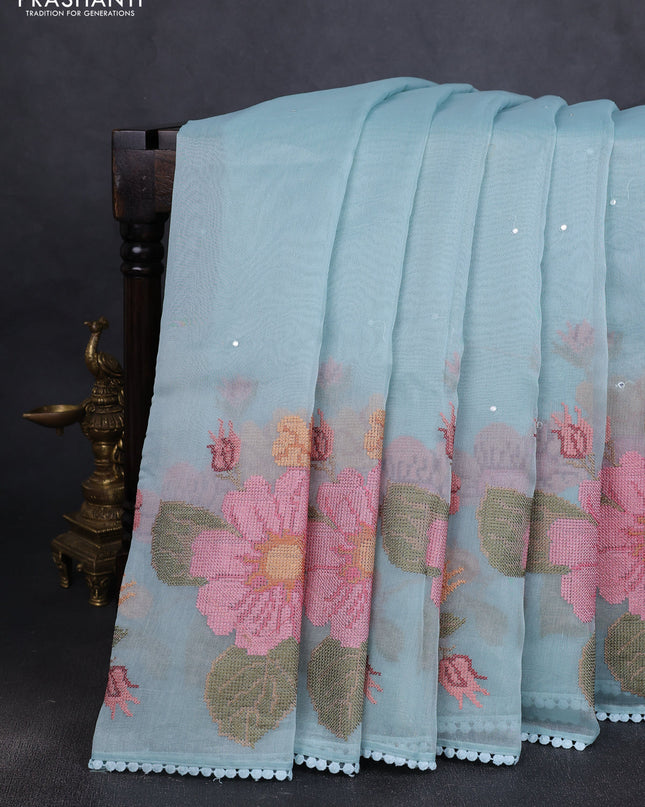 Chander tissue saree teal blue with mirror embroidery work and floral embroidery border