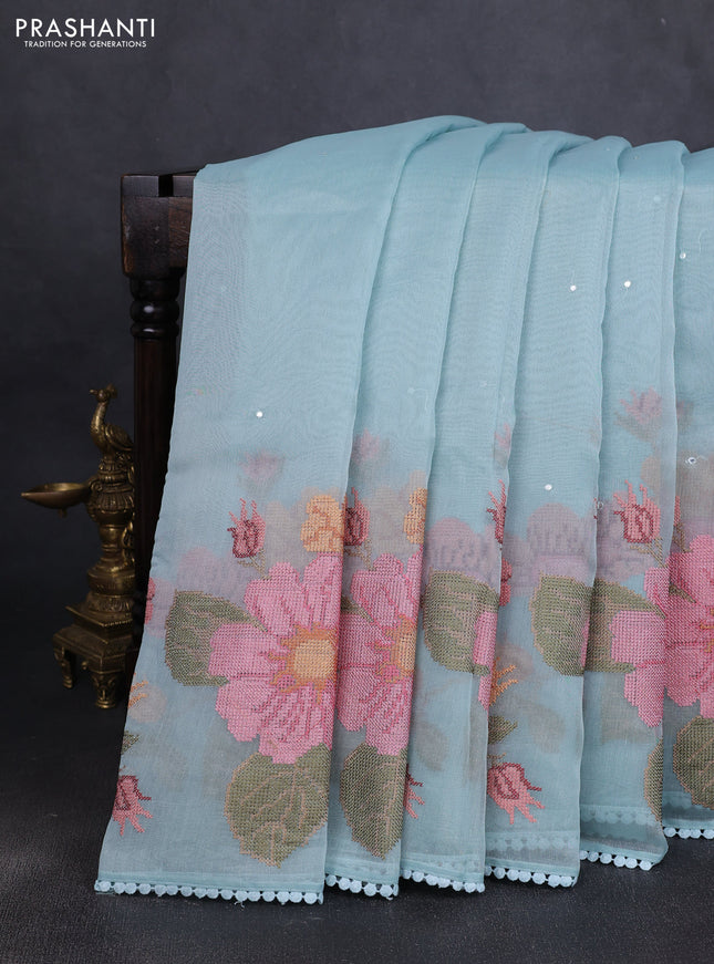 Chander tissue saree teal blue with mirror embroidery work and floral embroidery border