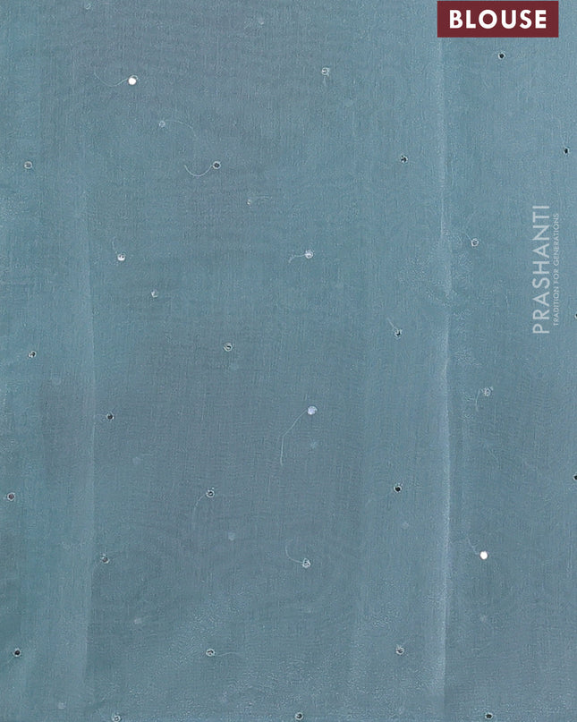 Chander tissue saree teal blue with mirror embroidery work and floral embroidery border
