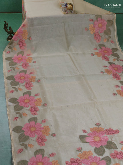 Chander tissue saree cream with mirror embroidery work and floral embroidery border