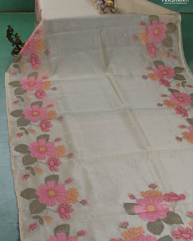 Chander tissue saree cream with mirror embroidery work and floral embroidery border