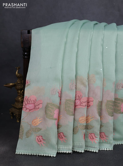 Chander tissue saree pastel green with mirror embroidery work and floral embroidery border