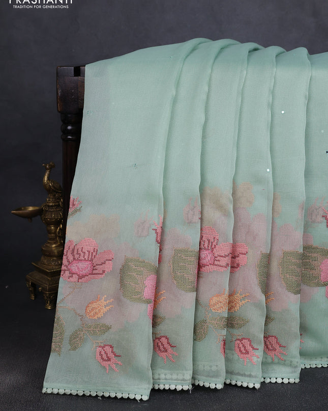 Chander tissue saree pastel green with mirror embroidery work and floral embroidery border