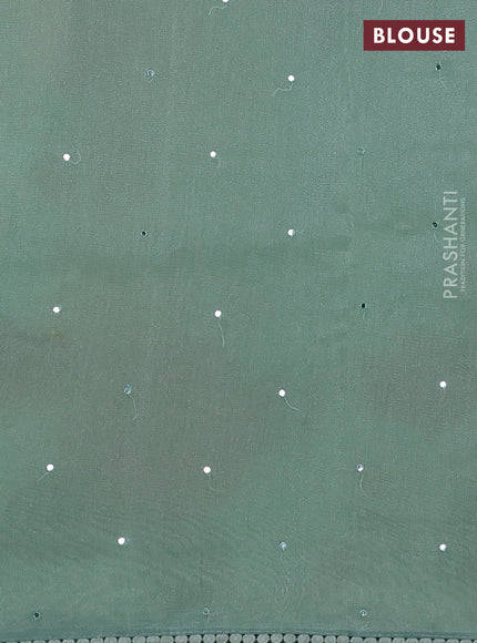 Chander tissue saree pastel green with mirror embroidery work and floral embroidery border
