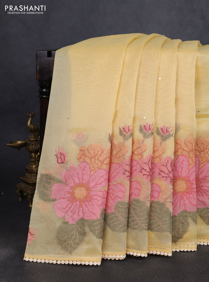 Chander tissue saree yellow with mirror embroidery work and floral embroidery border
