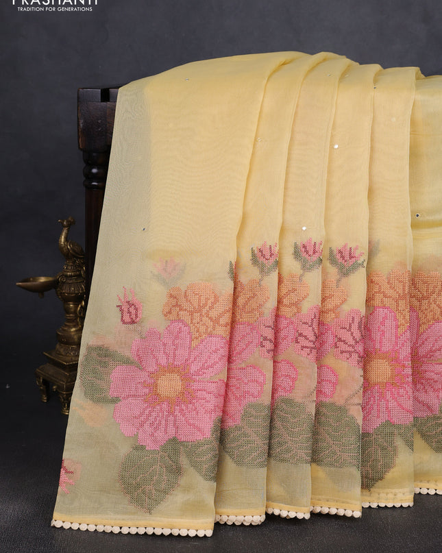 Chander tissue saree yellow with mirror embroidery work and floral embroidery border