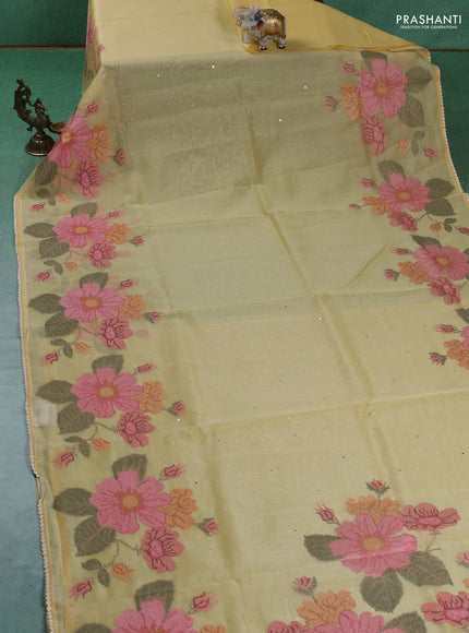 Chander tissue saree yellow with mirror embroidery work and floral embroidery border