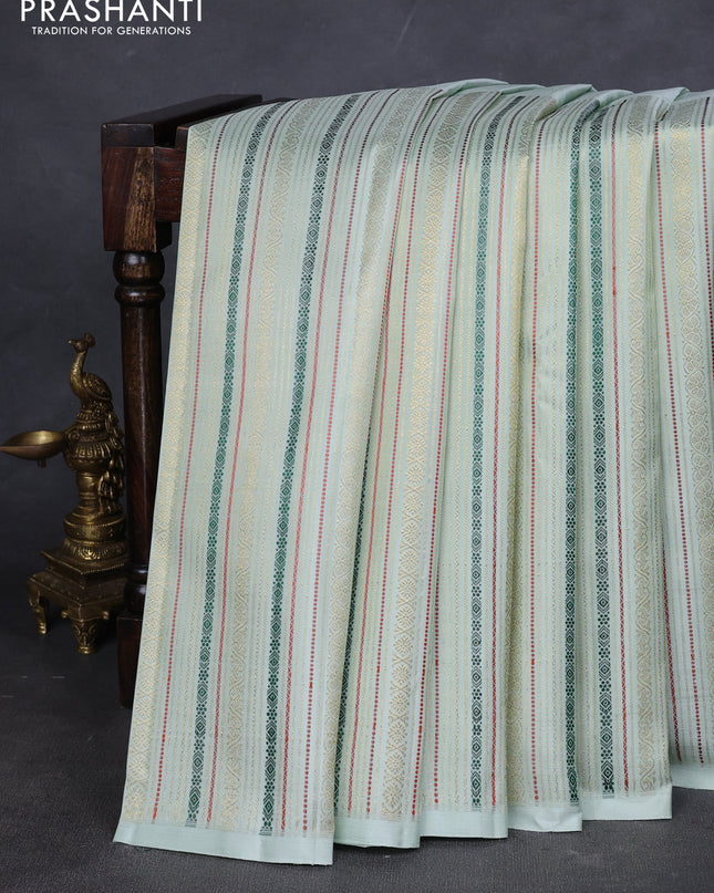 Pure kanchipuram silk saree pastel green with half & half style and long thread & zari woven border