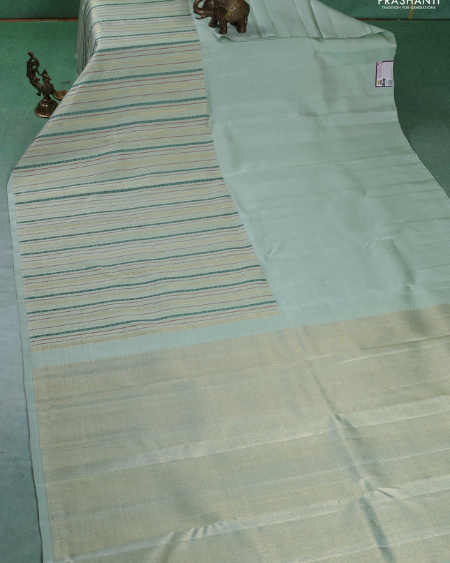Pure kanchipuram silk saree pastel green with half & half style and long thread & zari woven border