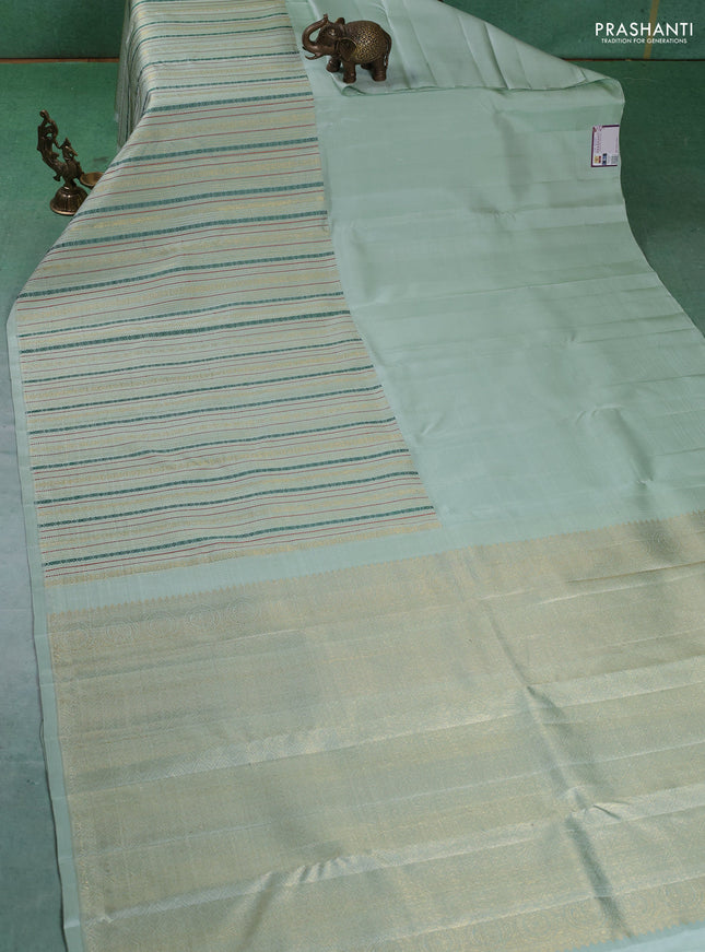 Pure kanchipuram silk saree pastel green with half & half style and long thread & zari woven border