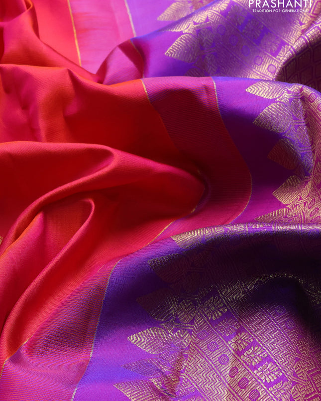 Pure kanchipuram silk saree dual shade of pinkish orange and purple with silver & gold zari woven floral buttas and zari woven border
