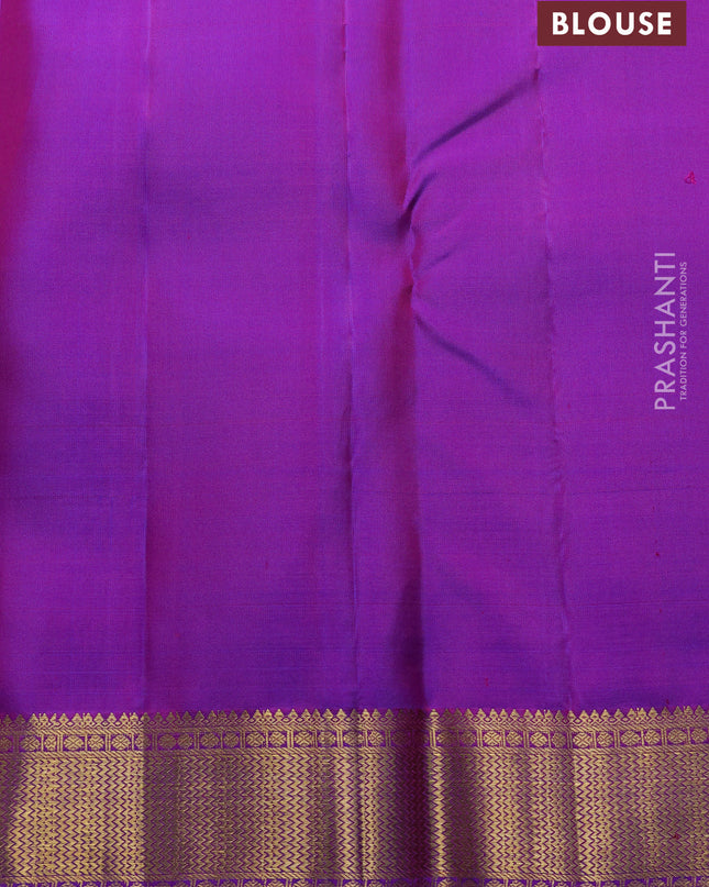 Pure kanchipuram silk saree dual shade of pinkish orange and purple with silver & gold zari woven floral buttas and zari woven border